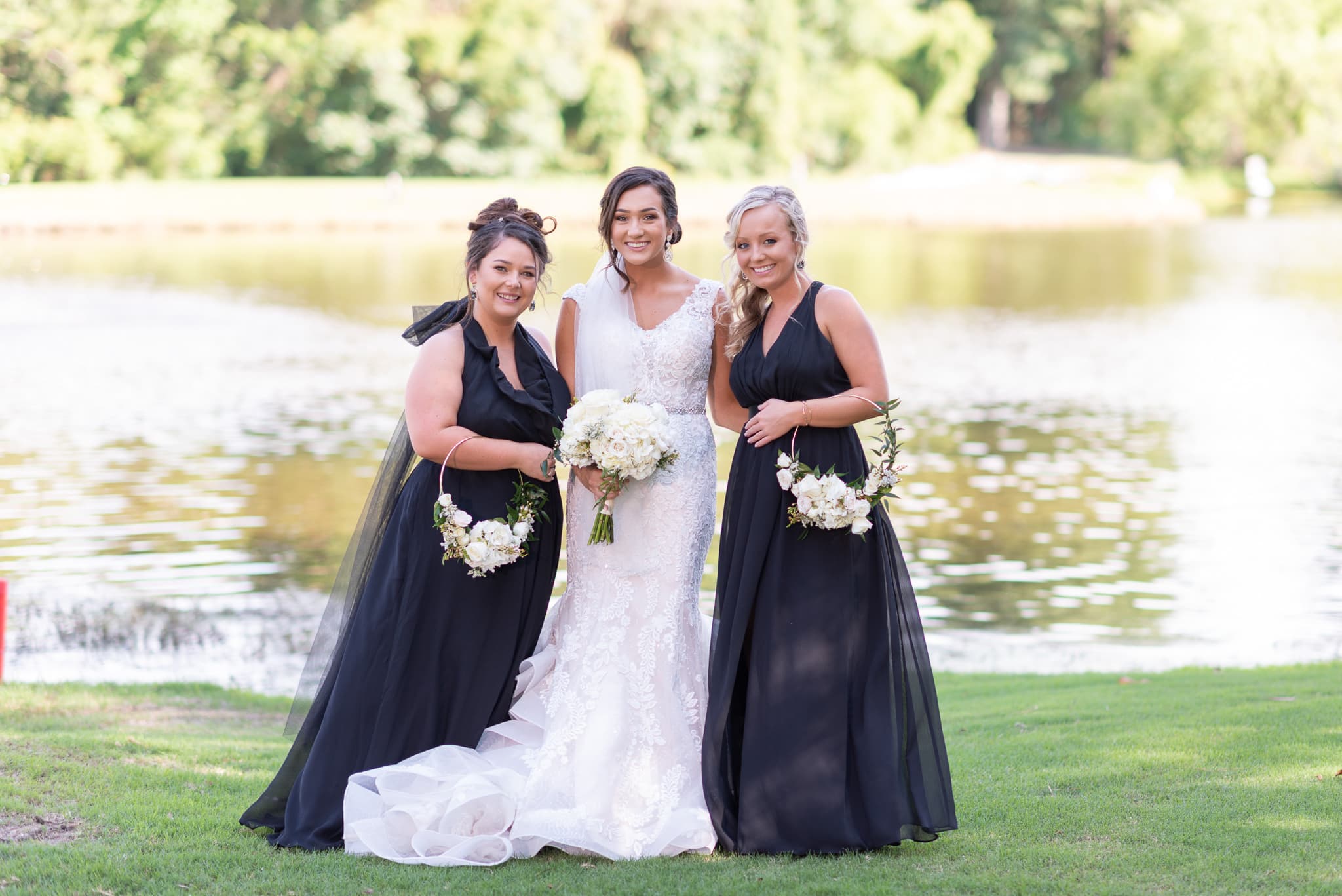 Bride and bridesmaids by the lake Pawleys Plantation