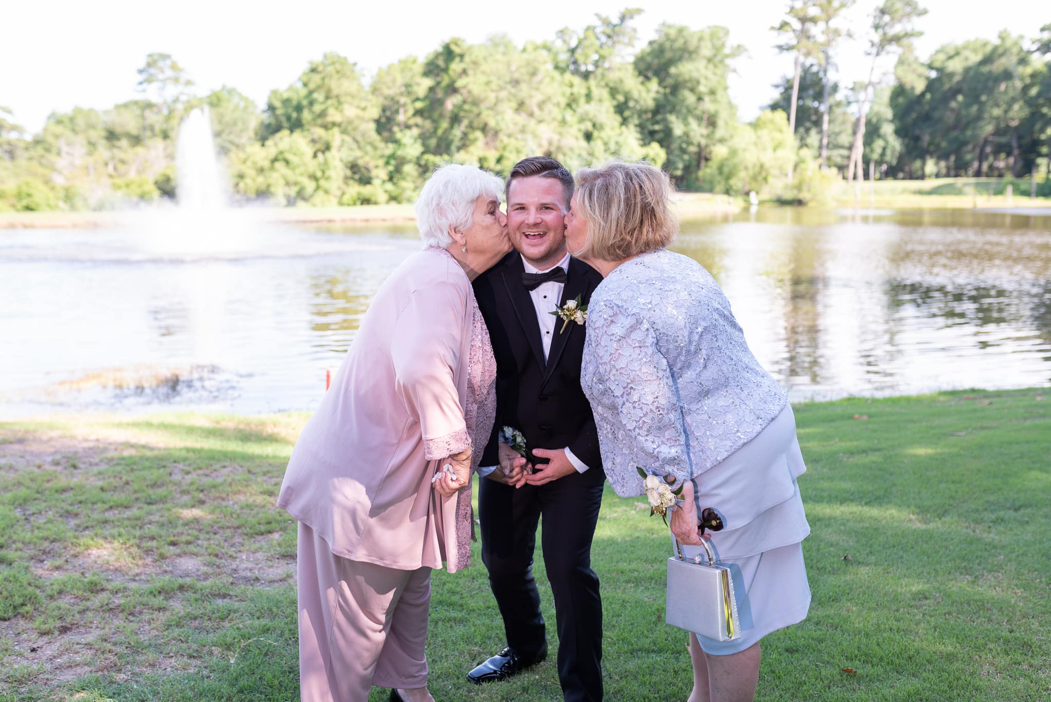 Groom getting kisses from Grandmothers Pawleys Plantation