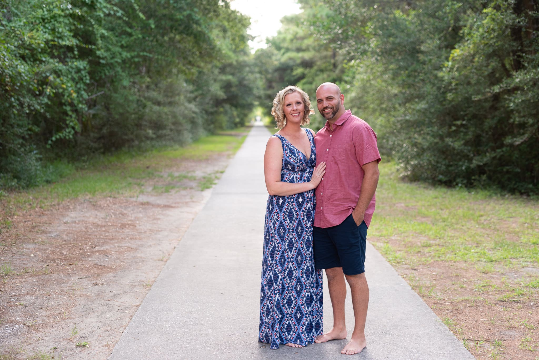 Couple standing on the old Brookgreen Gardens path - Huntington Beach State Park