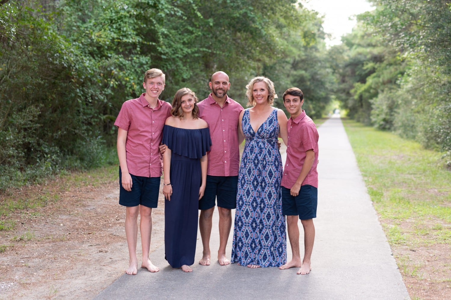Family on the old pathway to Brookgreen Gardnes - Huntington Beach State Park