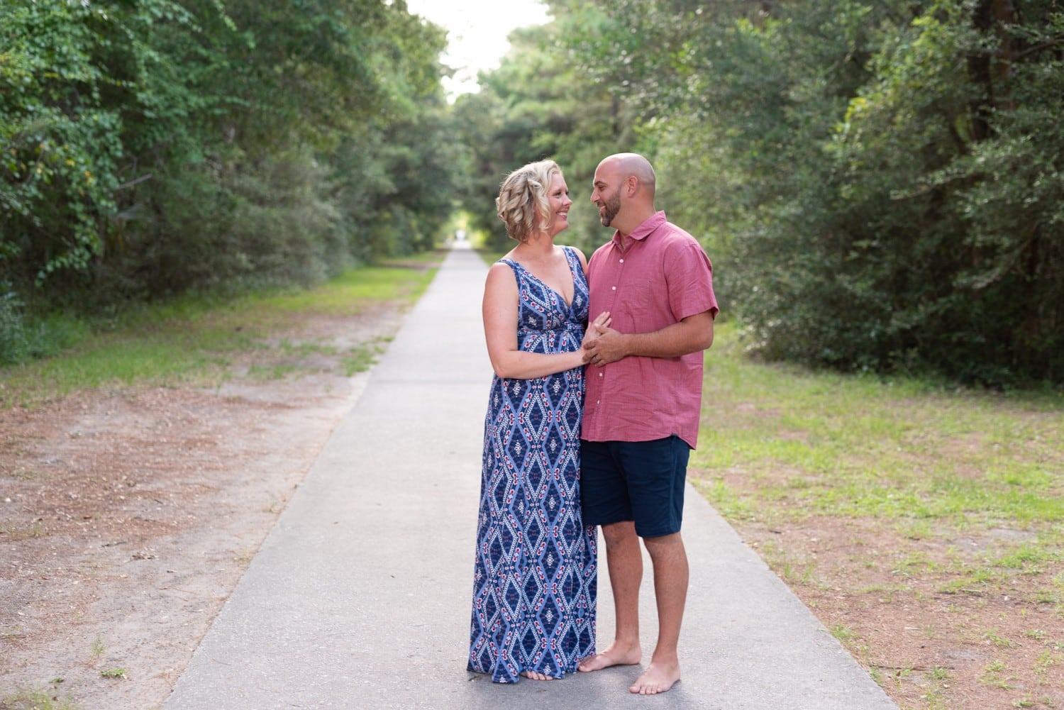 Happy couple on the pathway - Huntington Beach State Park