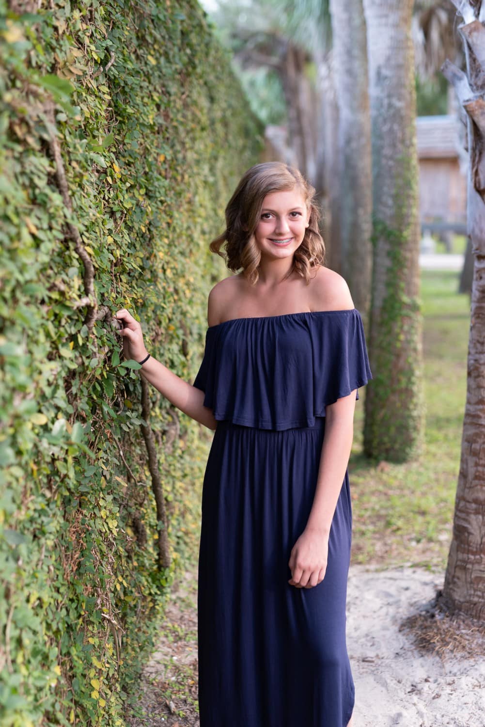 Portraits by the ivy covered wall of the Atalaya Castle - Huntington Beach State Park