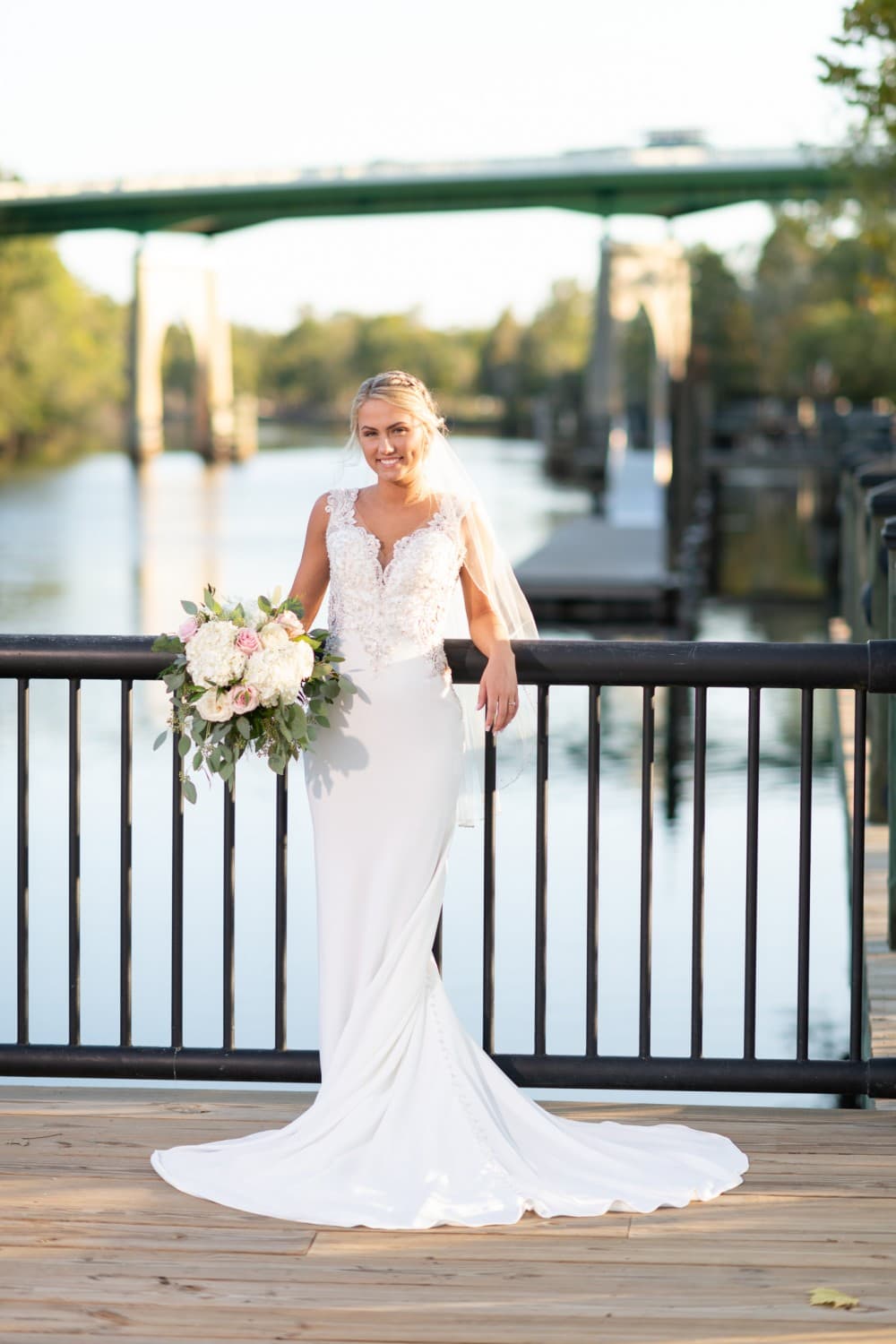 Bridal portrait with old Conway bridge in the background - Conway River Walk