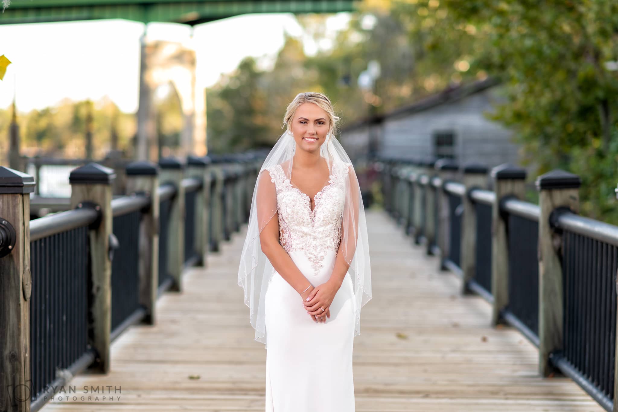 Bride standing Conway River Walk boardwalk - Conway River Walk