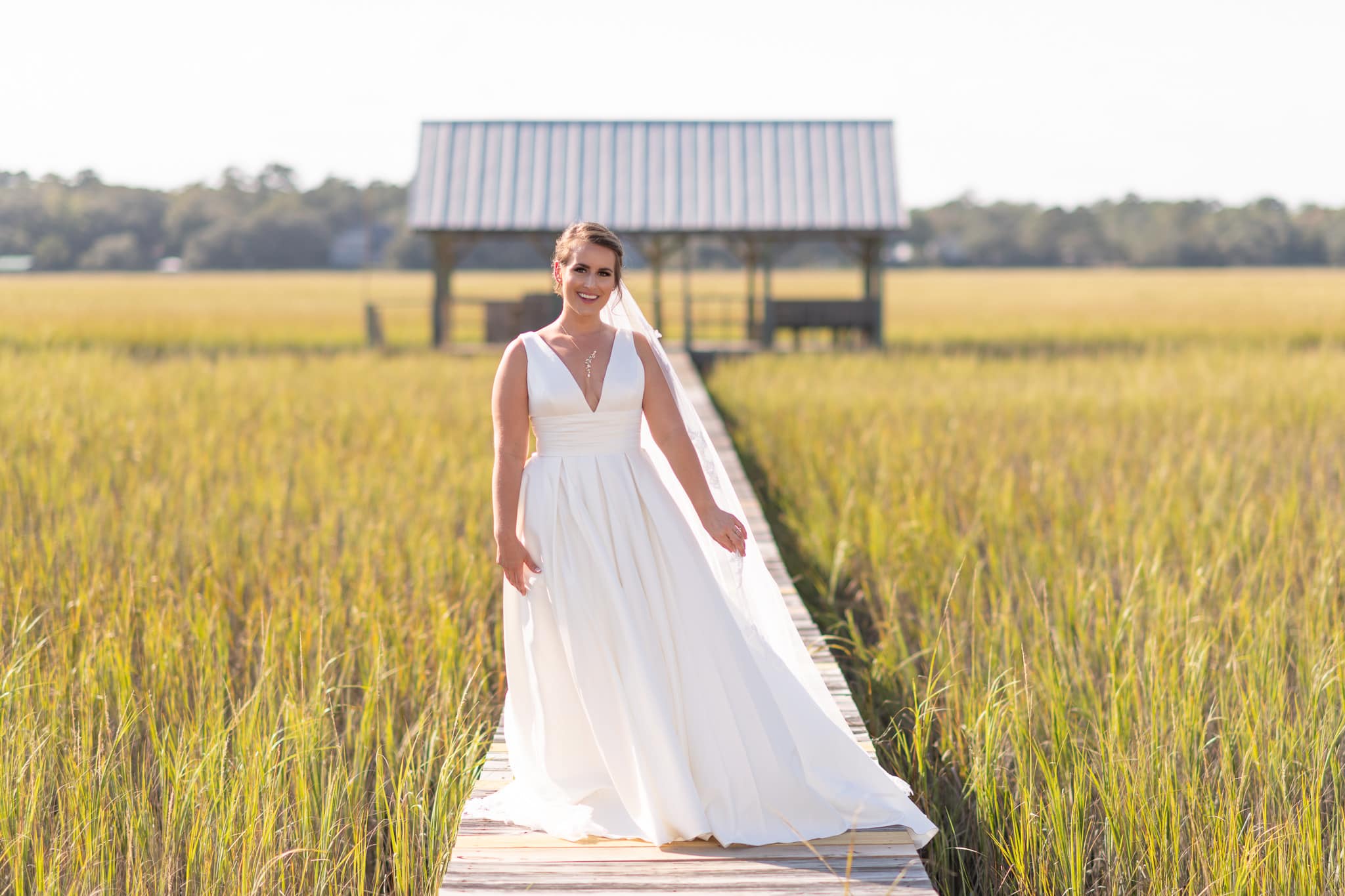 Portrait of bride on marsh boardwalk before the ceremony - Pelican Inn - Pawleys Island