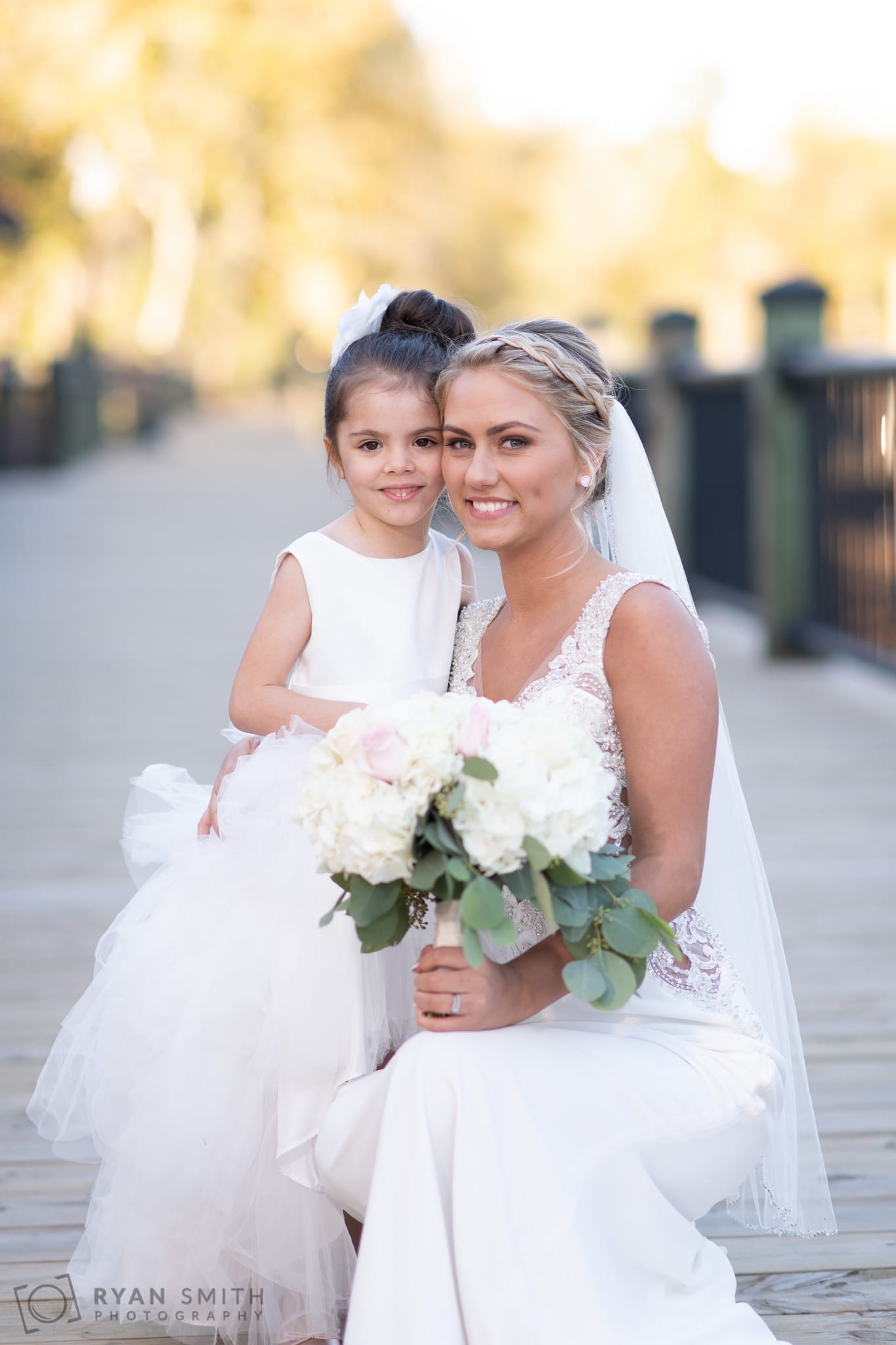Bride and flower girl - Conway River Walk