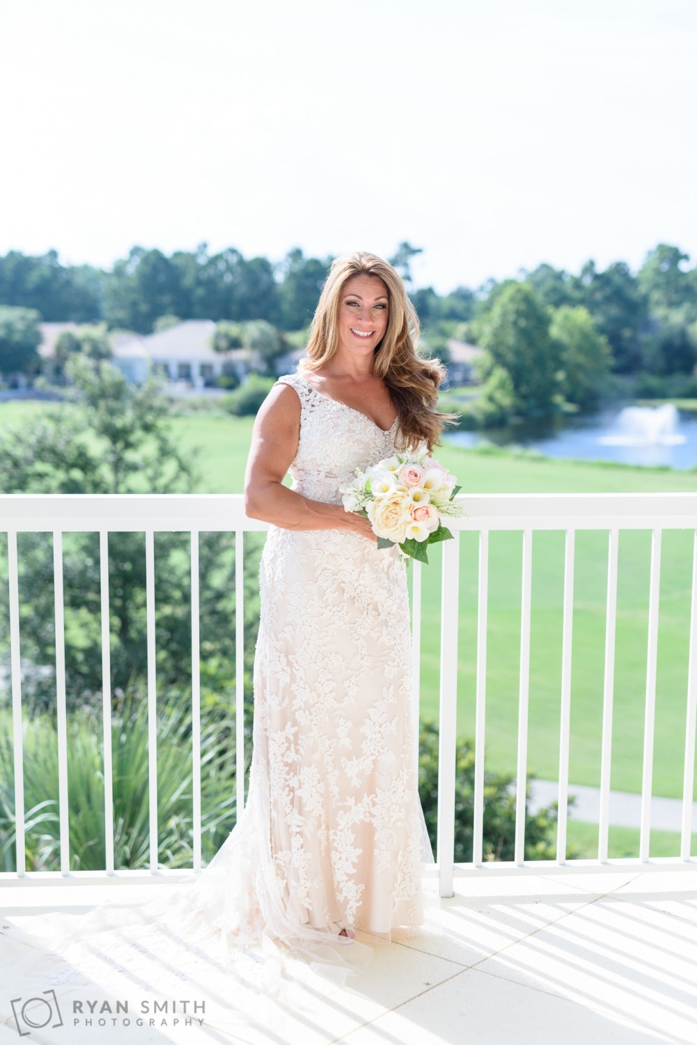 Bride on the balcony - Members Club at Grande Dunes