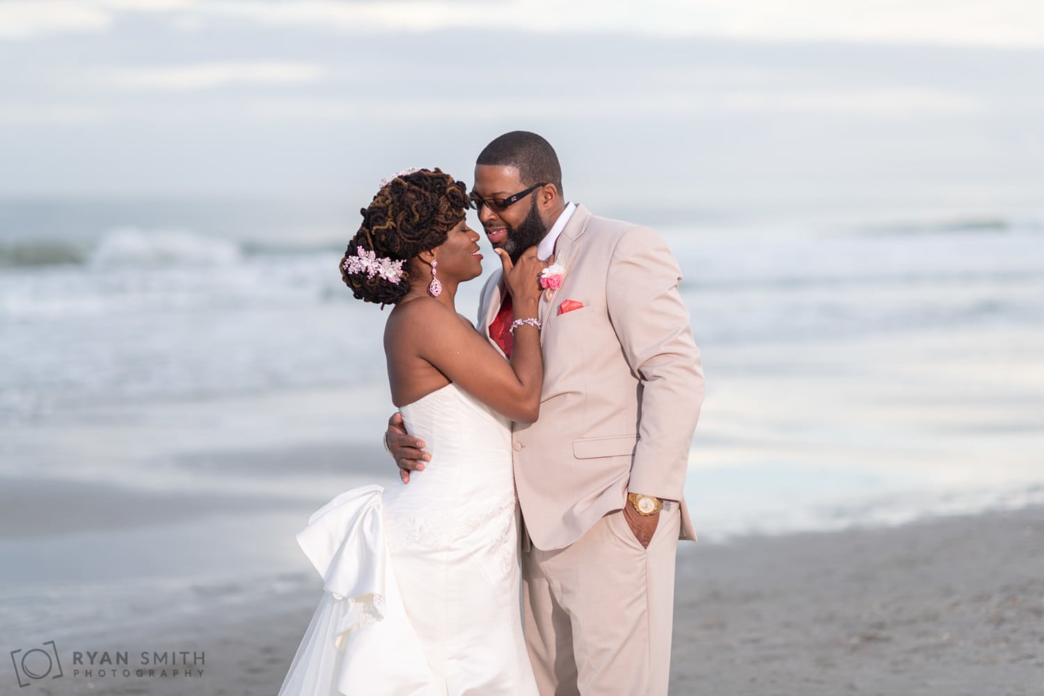 Bride touching grooms face - Doubletree Resort - Myrtle Beach