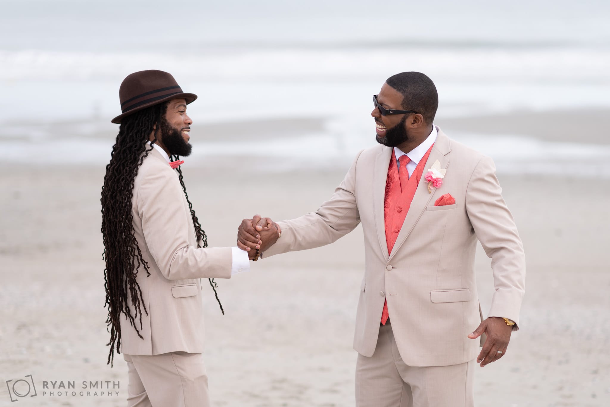 Groom shaking hands with groomsmen - Doubletree Resort - Myrtle Beach