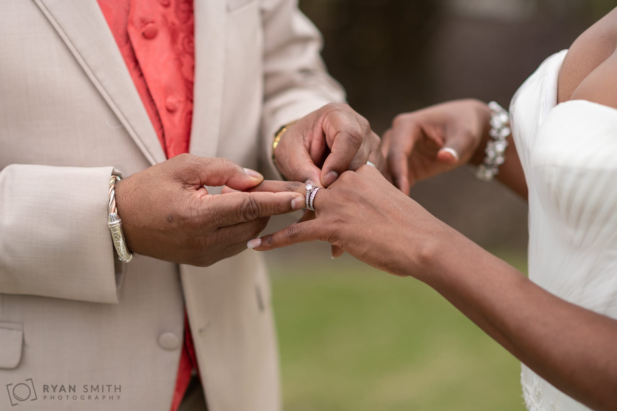 Groom touching the bride's ring - Doubletree Resort - Myrtle Beach