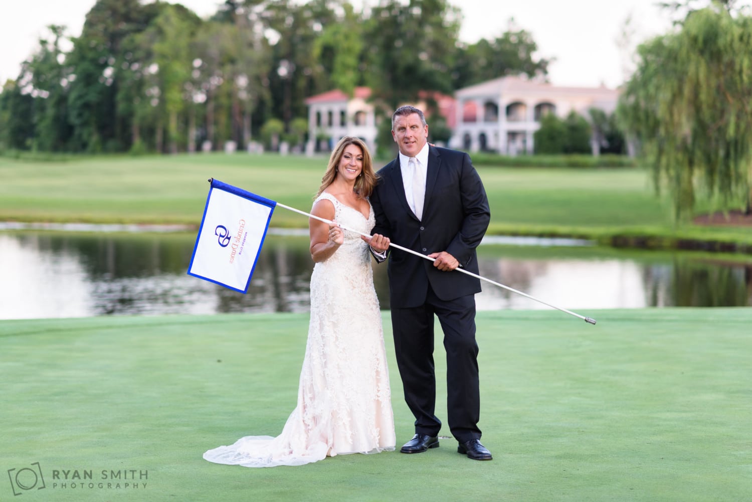 Holding the Grande Dunes golf course flag - Members Club at Grande Dunes