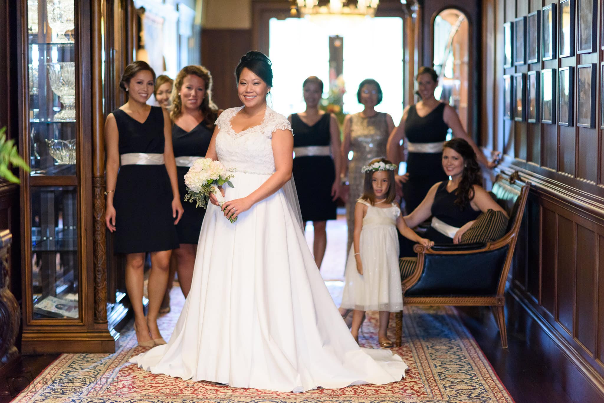 Bride and bridesmaids in the hallway - Dye Club at Barefoot Resort