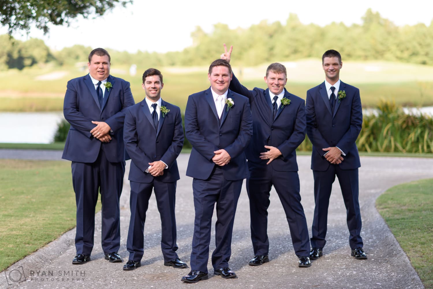 Pictures with the groomsmen before the ceremony - Dye Club at Barefoot Resort