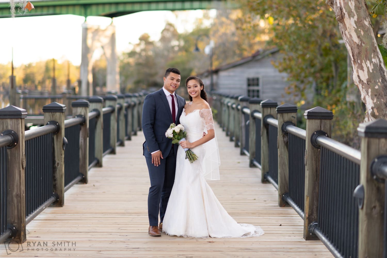 Portraits of husband and wife on the boardwalk - Conway Riverwalk