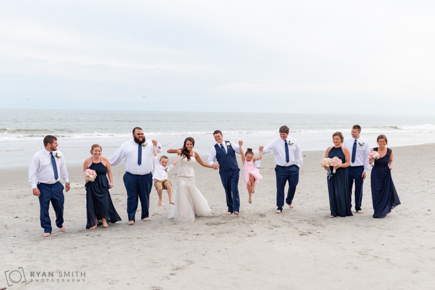 Wedding party having fun on the beach - Avista Resort - North Myrtle Beach