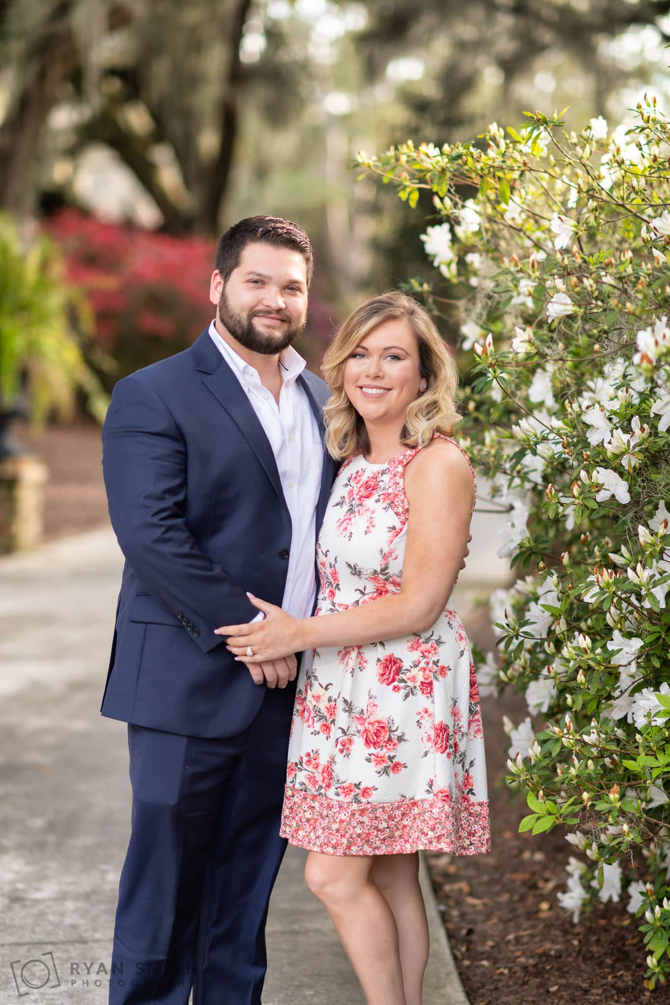 Engagement portrait by the flowers - Caledonia Golf & Fish Club