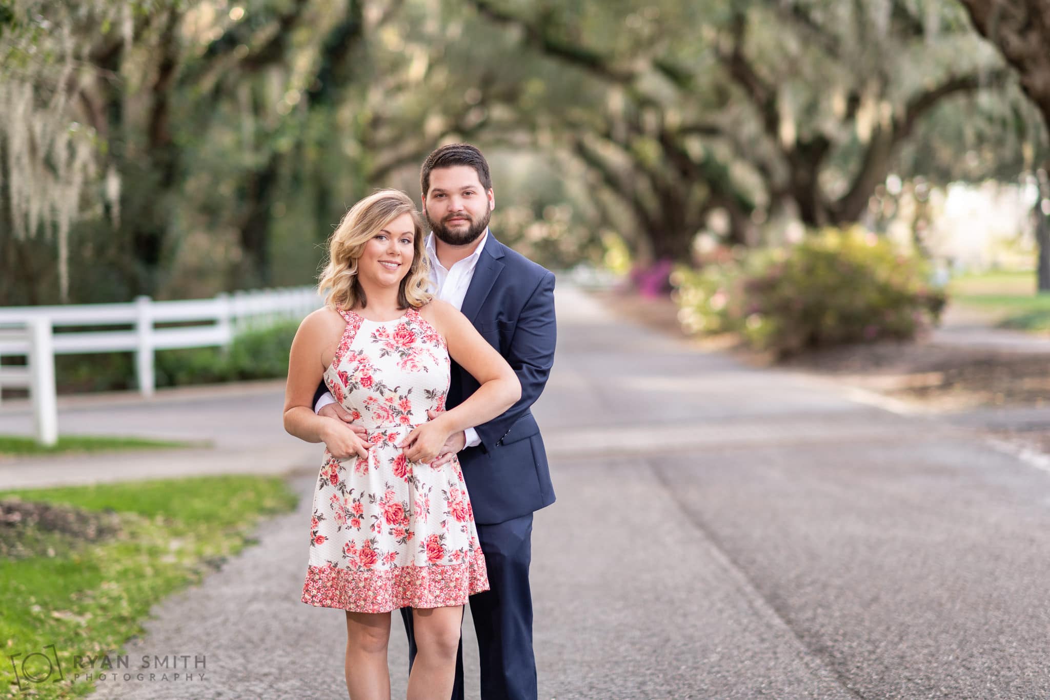 Engagement portrait under the moss covered roadway - Caledonia Golf & Fish Club