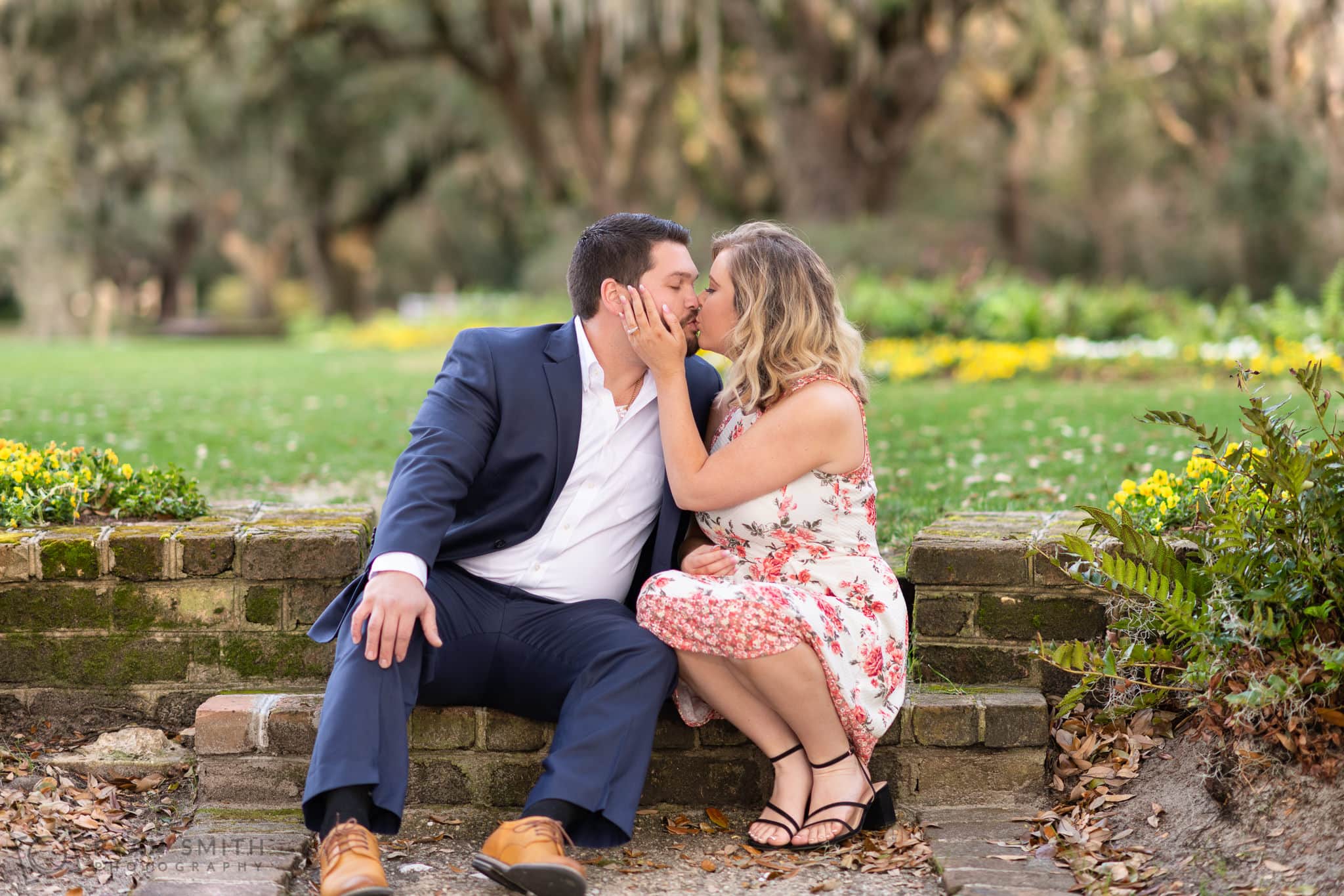 Kiss on the brick steps by the golf course - Caledonia Golf & Fish Club