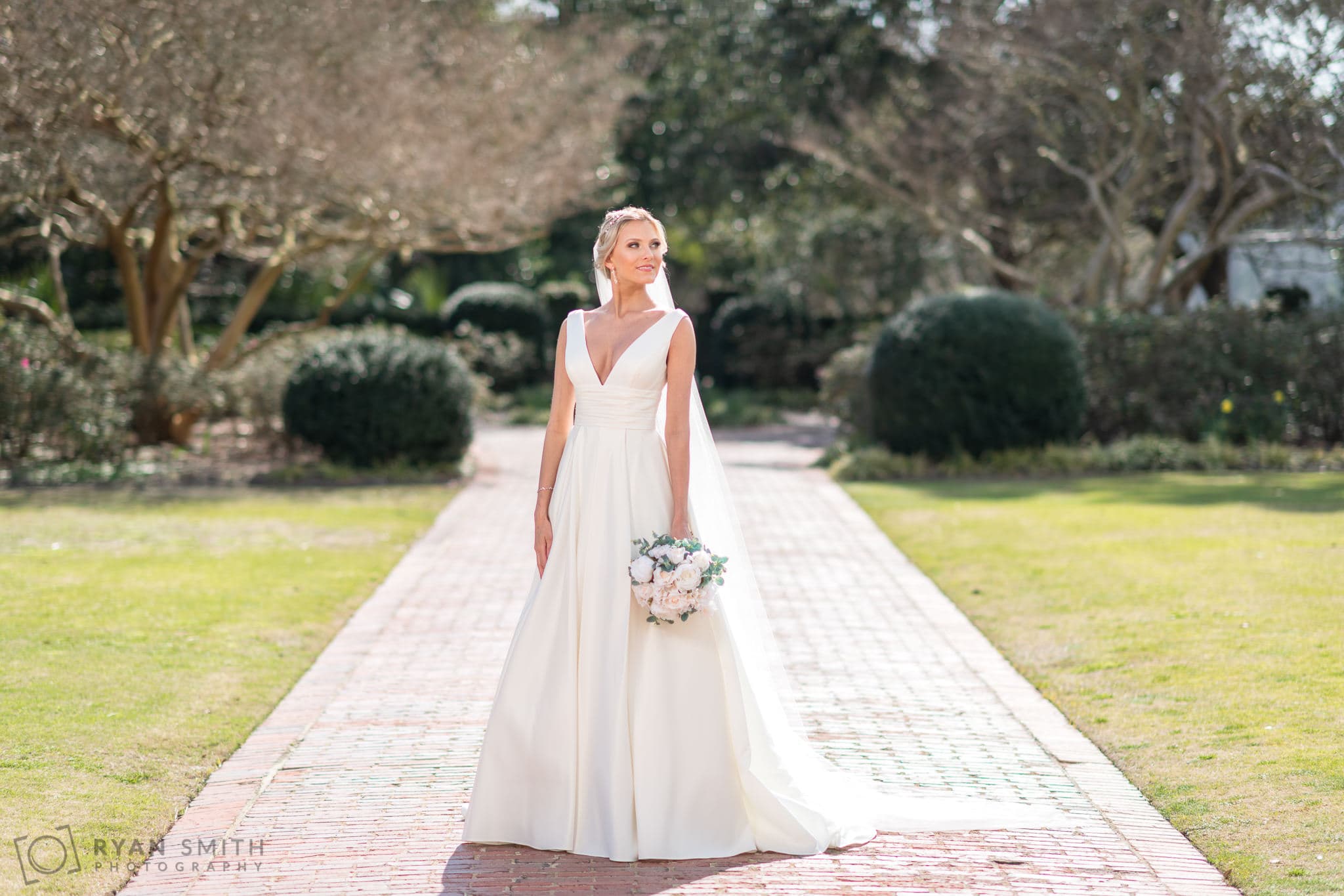 Bride looking off camera - Pine Lakes Country Club