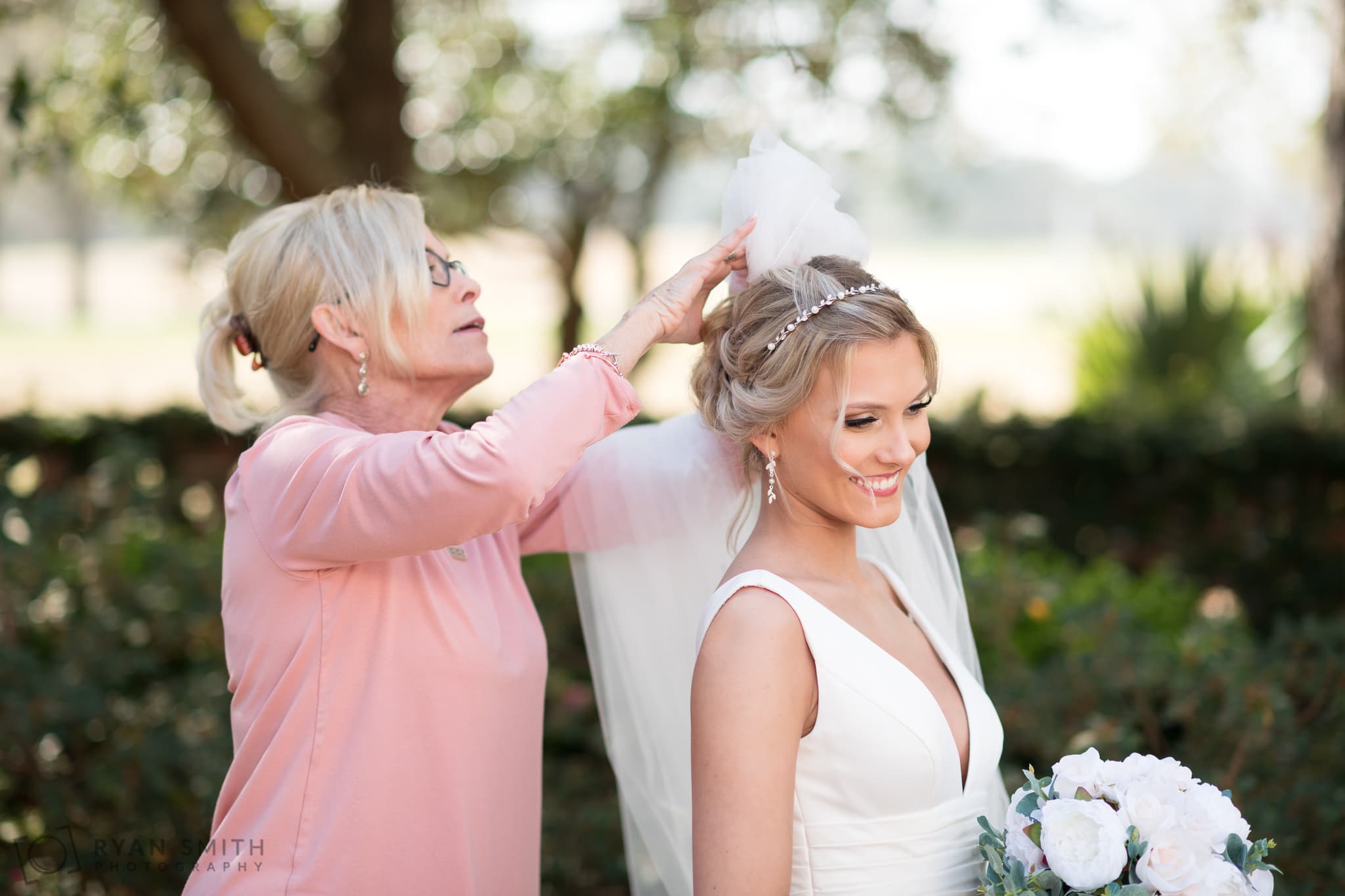 Mom helping bride put in her veil - Pine Lakes Country Club
