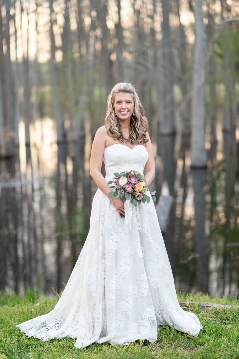 Portrait of bride in front of the marsh - Wildhorse at Parker Farms