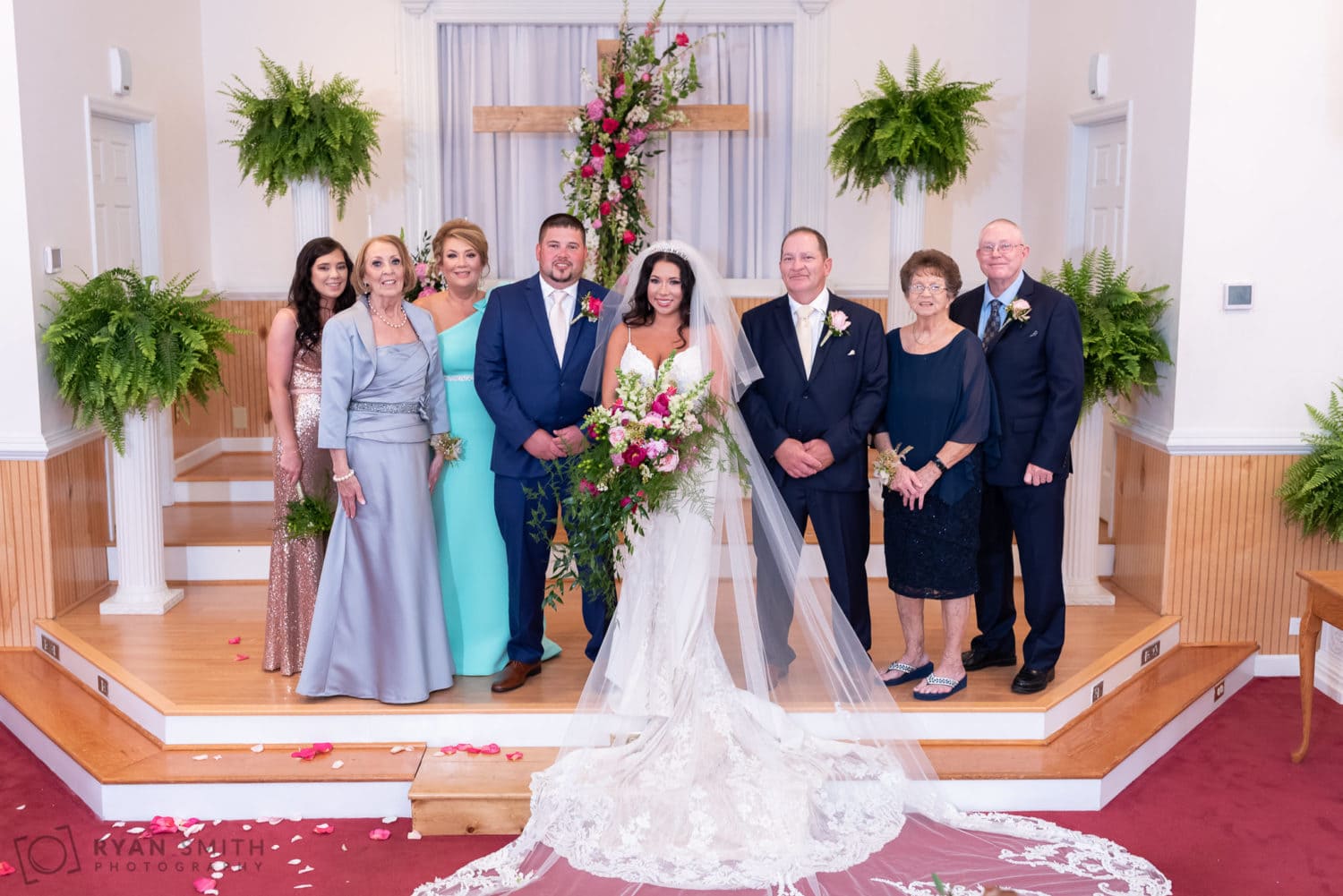 Bride and groom with family - Hidden Acres