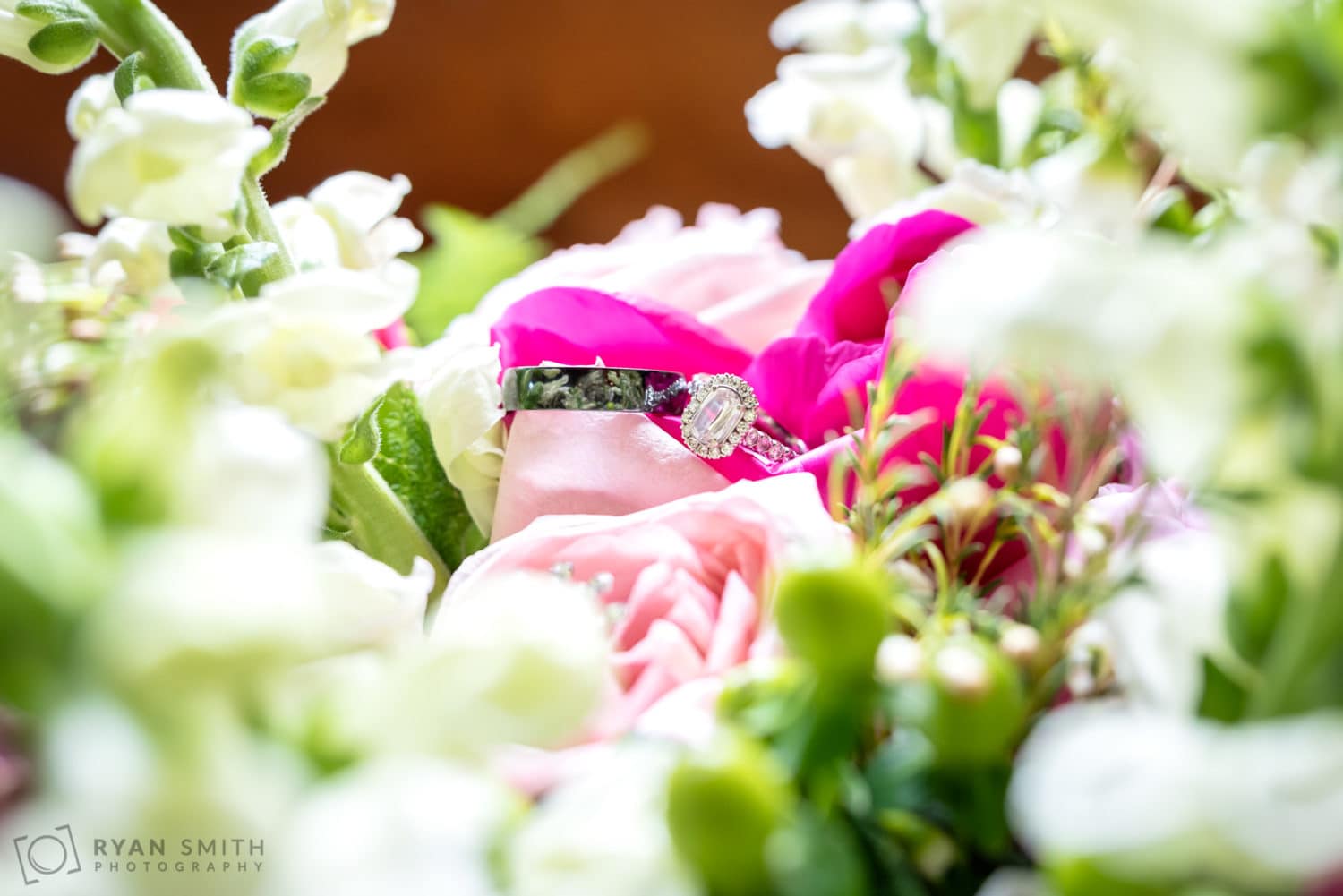 Wedding ring on the flowers - Hidden Acres