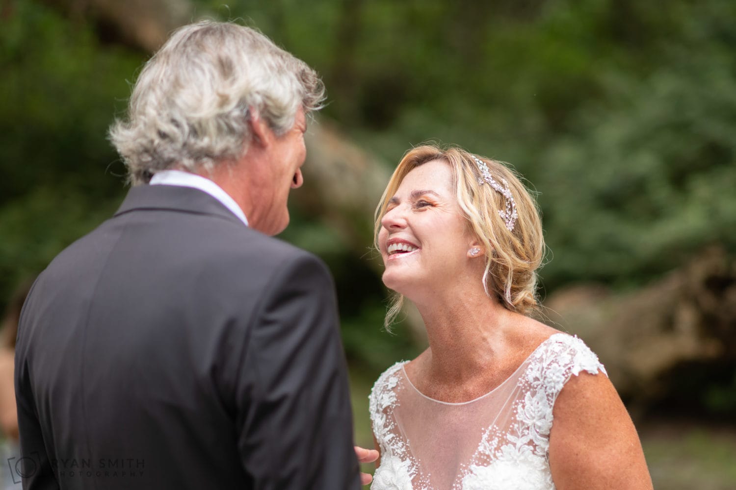 Bride laughing during the vows - Holiday Cottage - Brookgreen Gardens