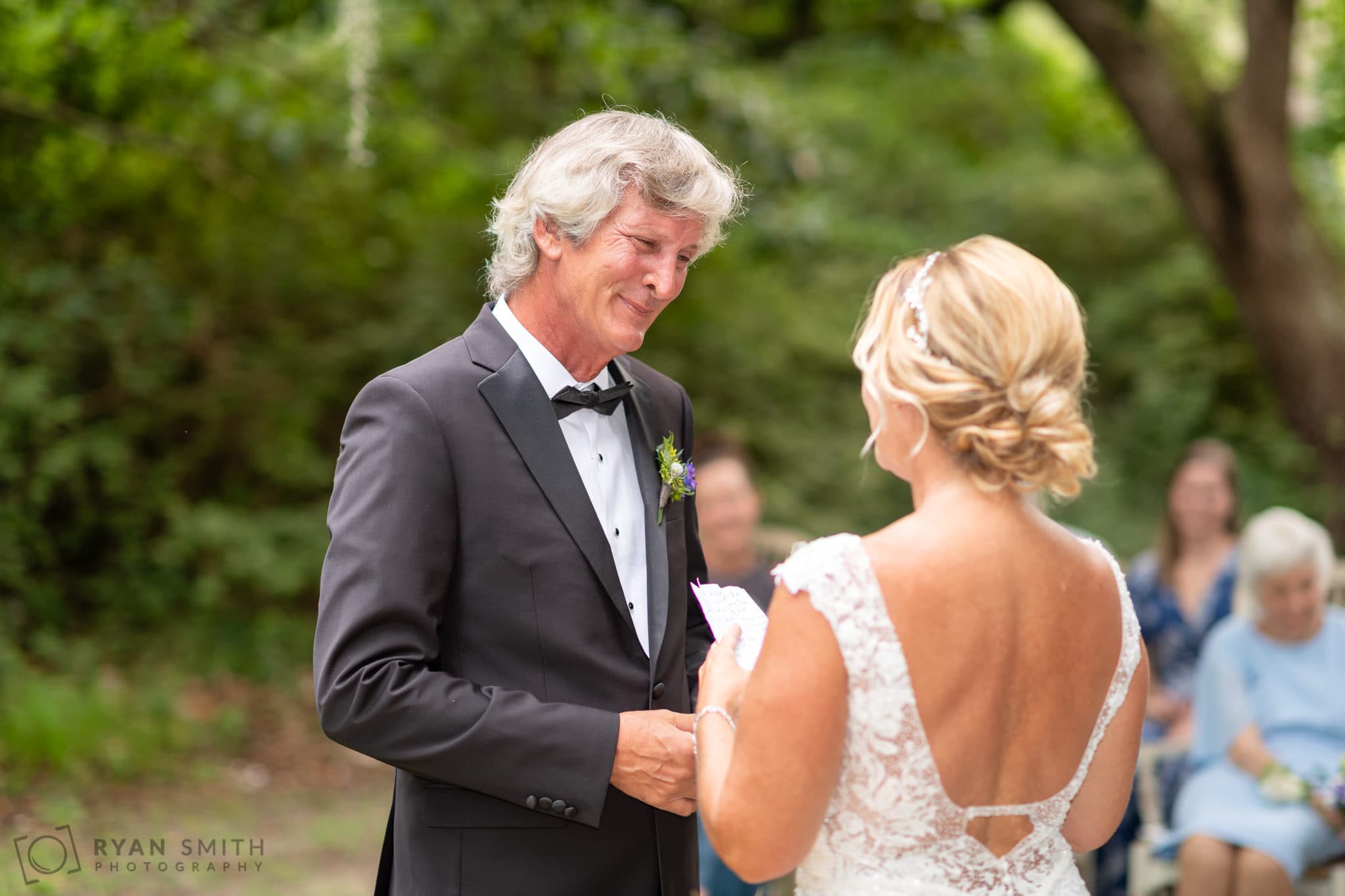 Bride reading vows to the groom - Holiday Cottage - Brookgreen Gardens