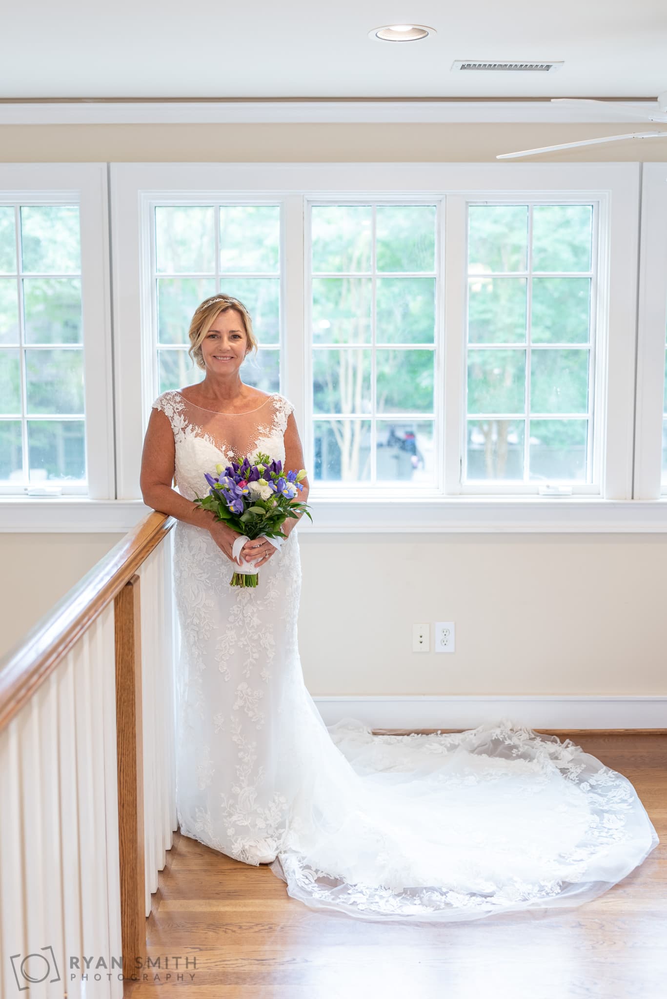Bride standing in front of the upstairs windows - Holiday Cottage - Brookgreen Gardens