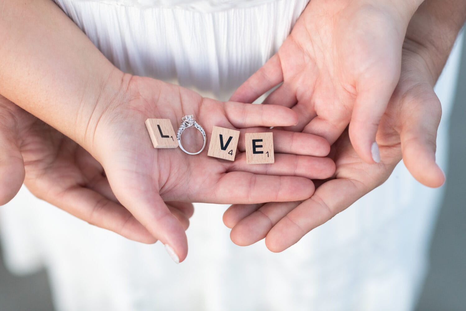 Spelling love with ring and scrabble pieces  - Huntington Beach State Park