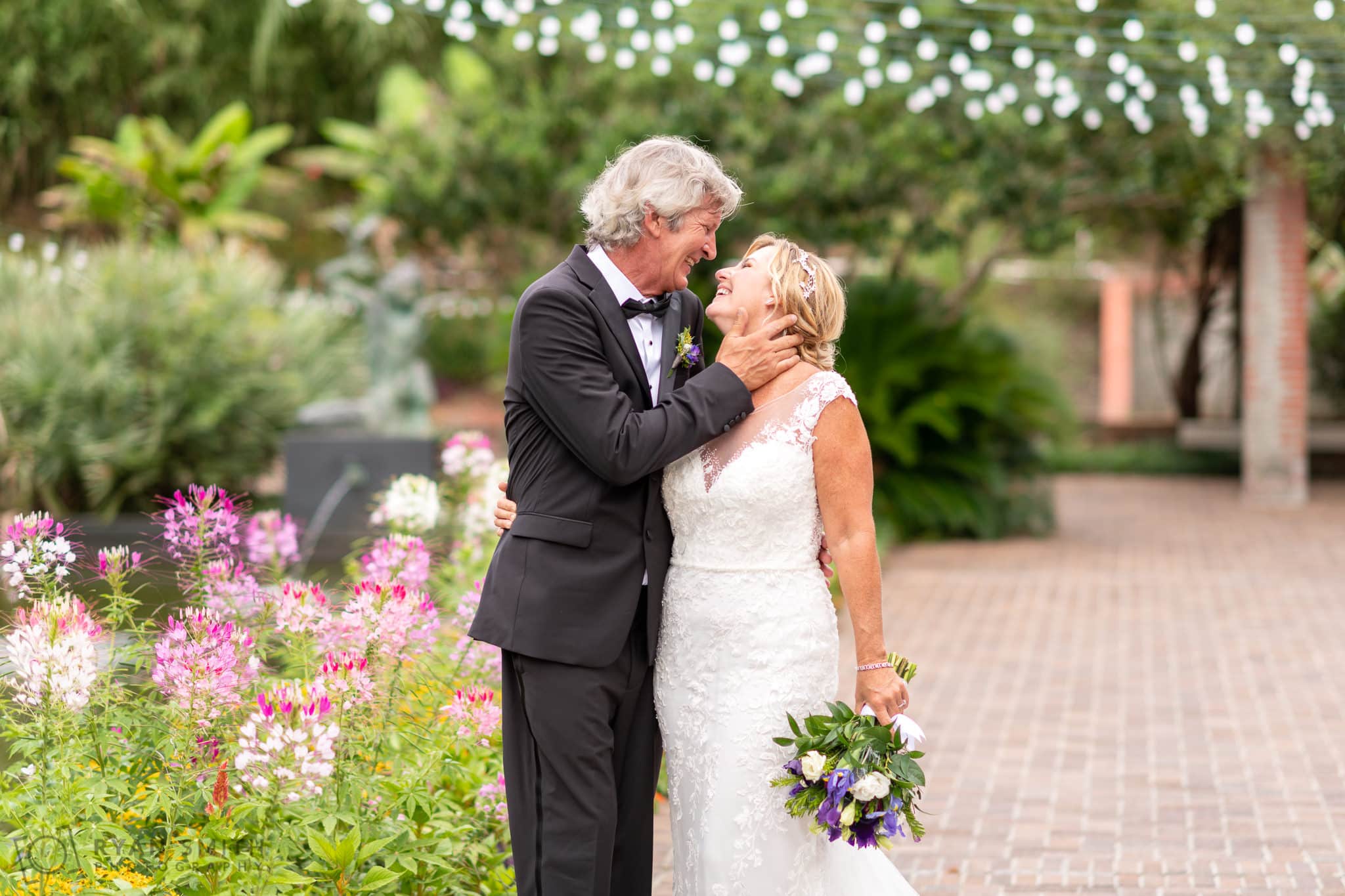 Groom touching bride's face - Fountain of the Muses - Brookgreen Gardens