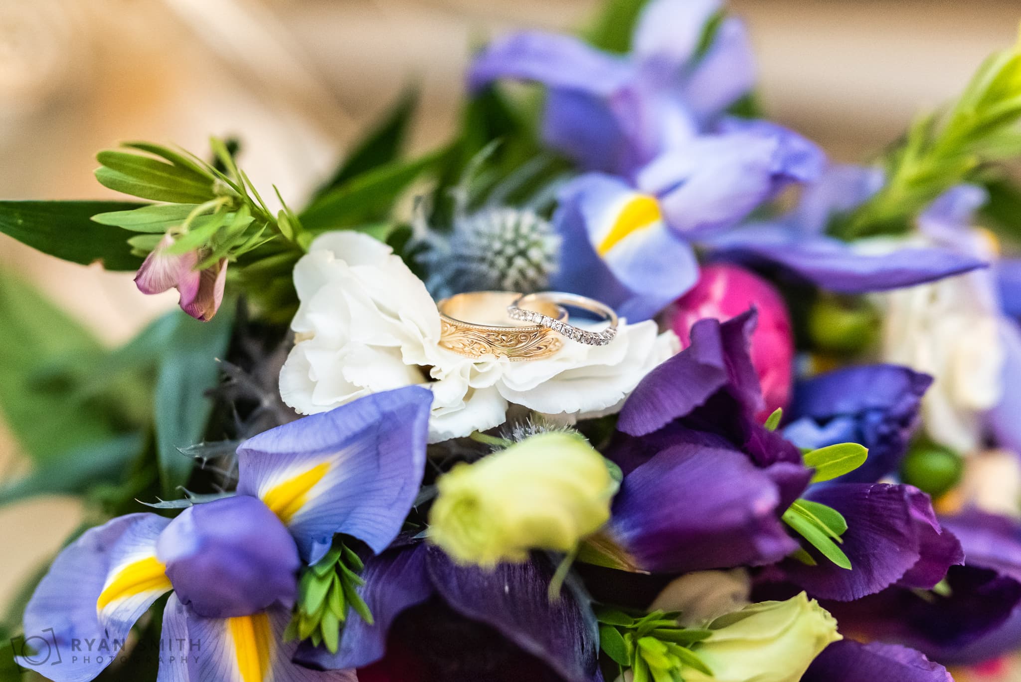 Wedding rings laying on the bouquet  - Holiday Cottage - Brookgreen Gardens