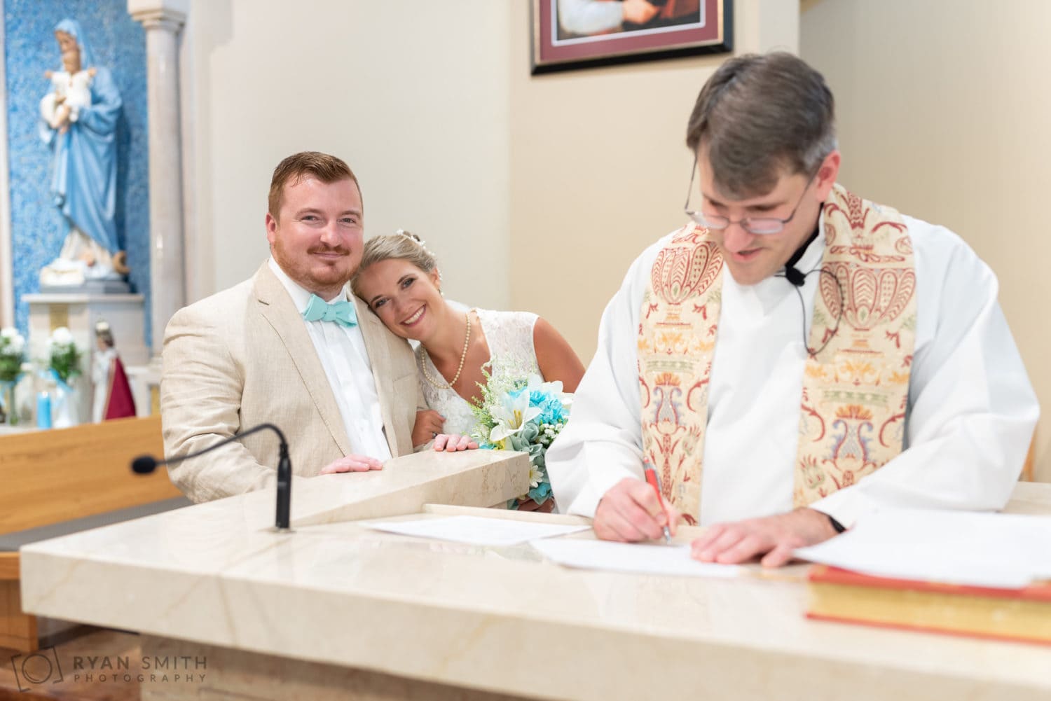 Happy bride and groom waiting to sign marriage license  - St. Michael's - Garden City, SC