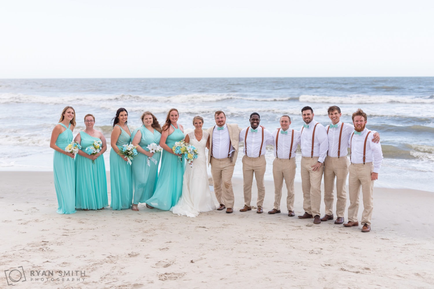 Pictures with the wedding party as the storm approached  - Atalaya Castle - Huntington Beach State Park