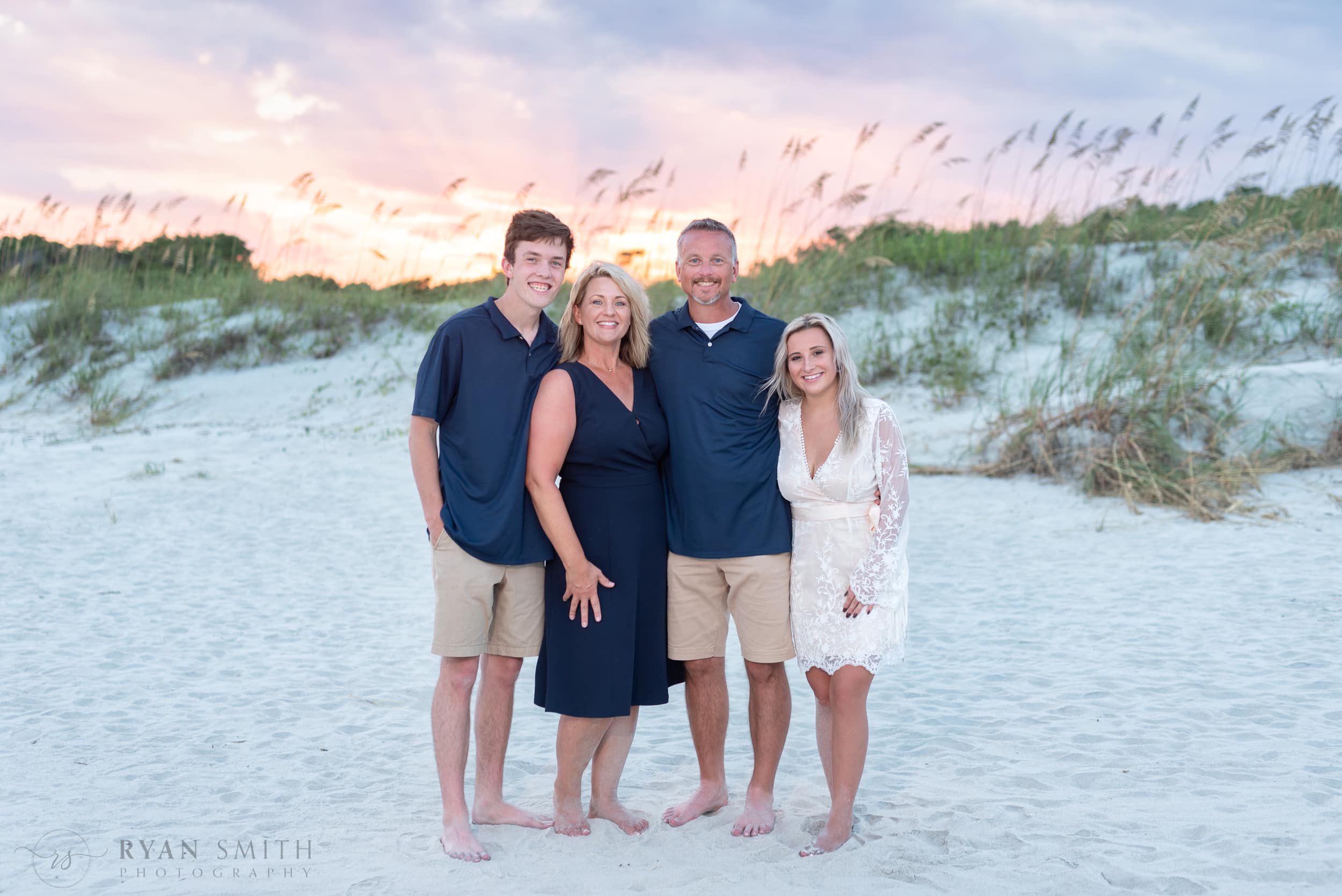 Family of 4 with a unusually beautiful sunset - Huntington Beach State Park