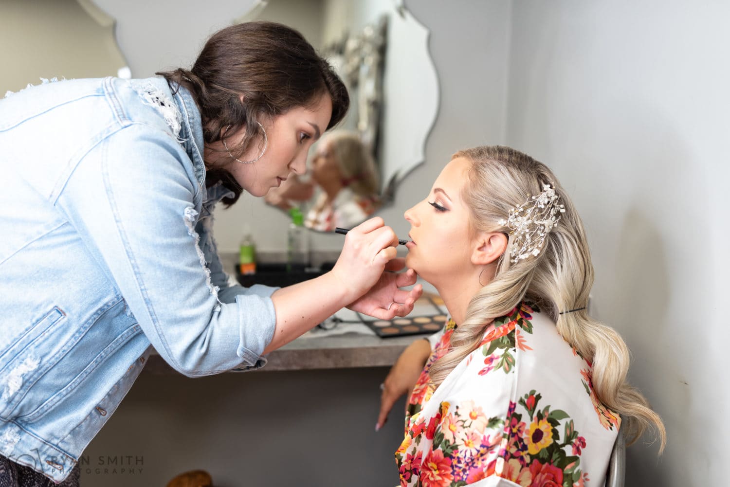 Bride getting lipstick applied - Litchfield Country Club