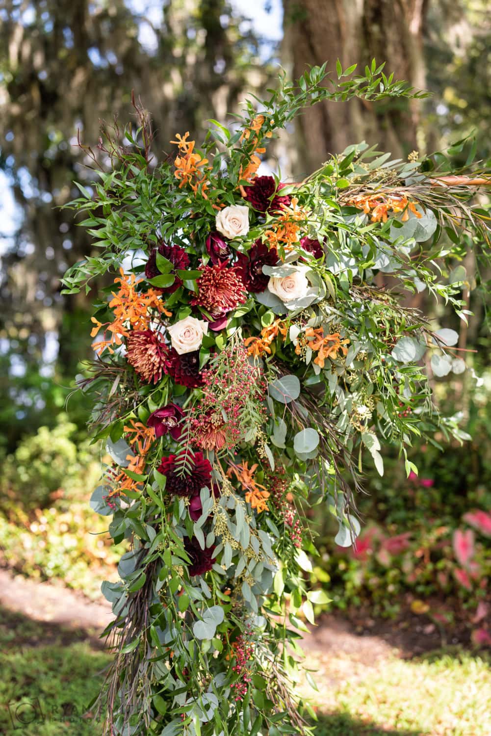 Flowers on the wedding arch  - Magnolia Plantation - Charleston, SC