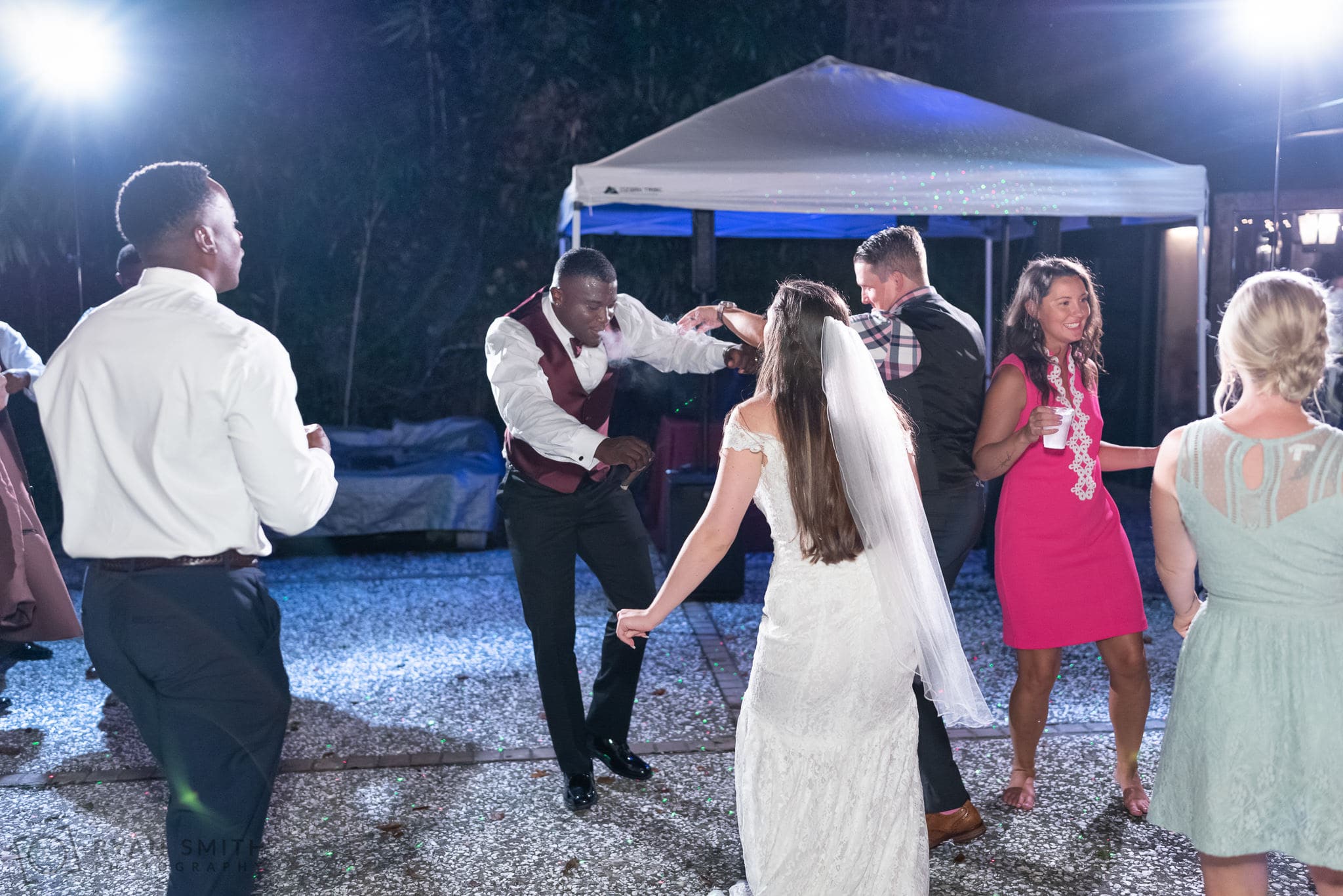 Fun dancing at outdoor reception - Magnolia Plantation - Charleston, SC