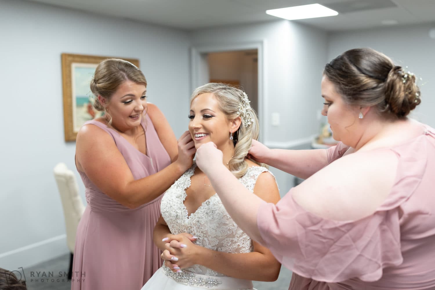 Helping bride with her necklace  - Litchfield Country Club