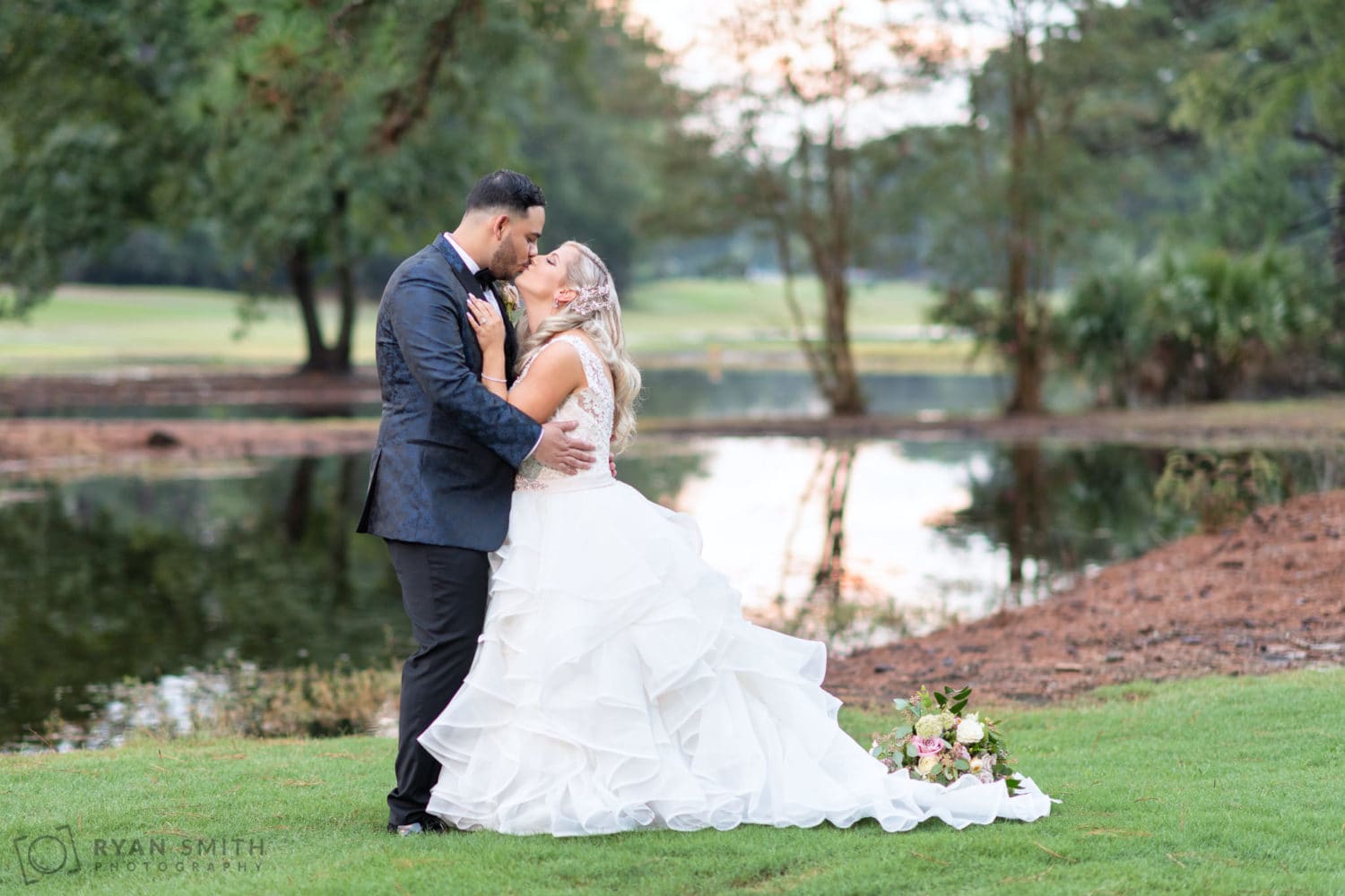 Kiss in front of the golf course lake - Litchfield Country Club
