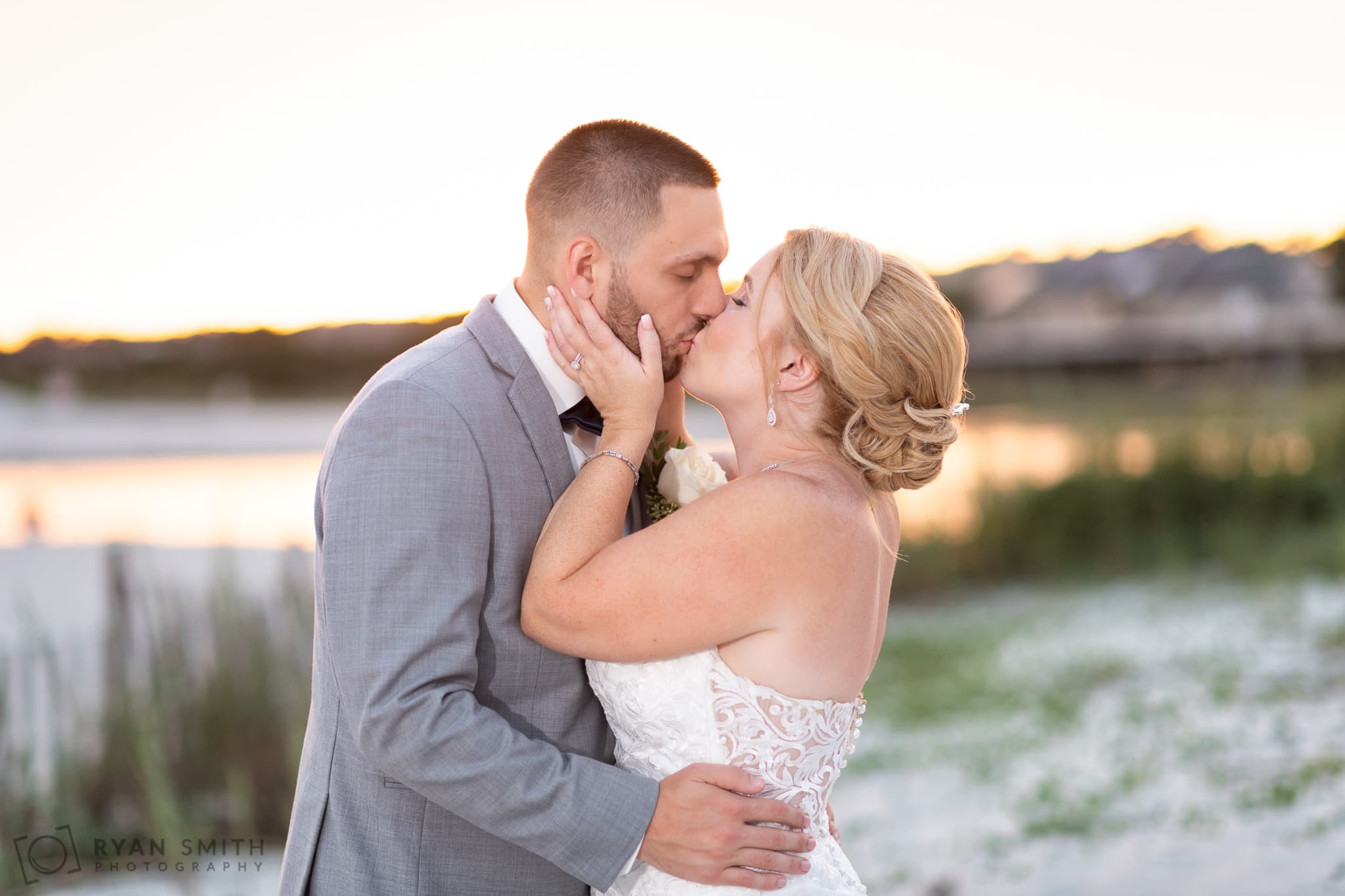 Portraits of bride and groom backlit by the sunset - 21 Main Events - North Myrtle Beach