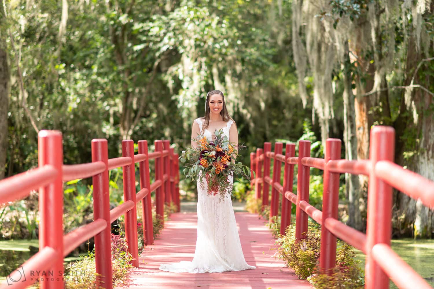 Portraits of bride on the red bridge - Magnolia Plantation - Charleston, SC