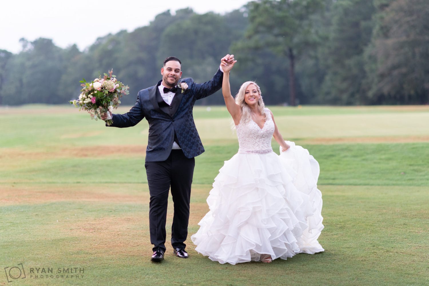 Spinning bride around on the golf course - Litchfield Country Club