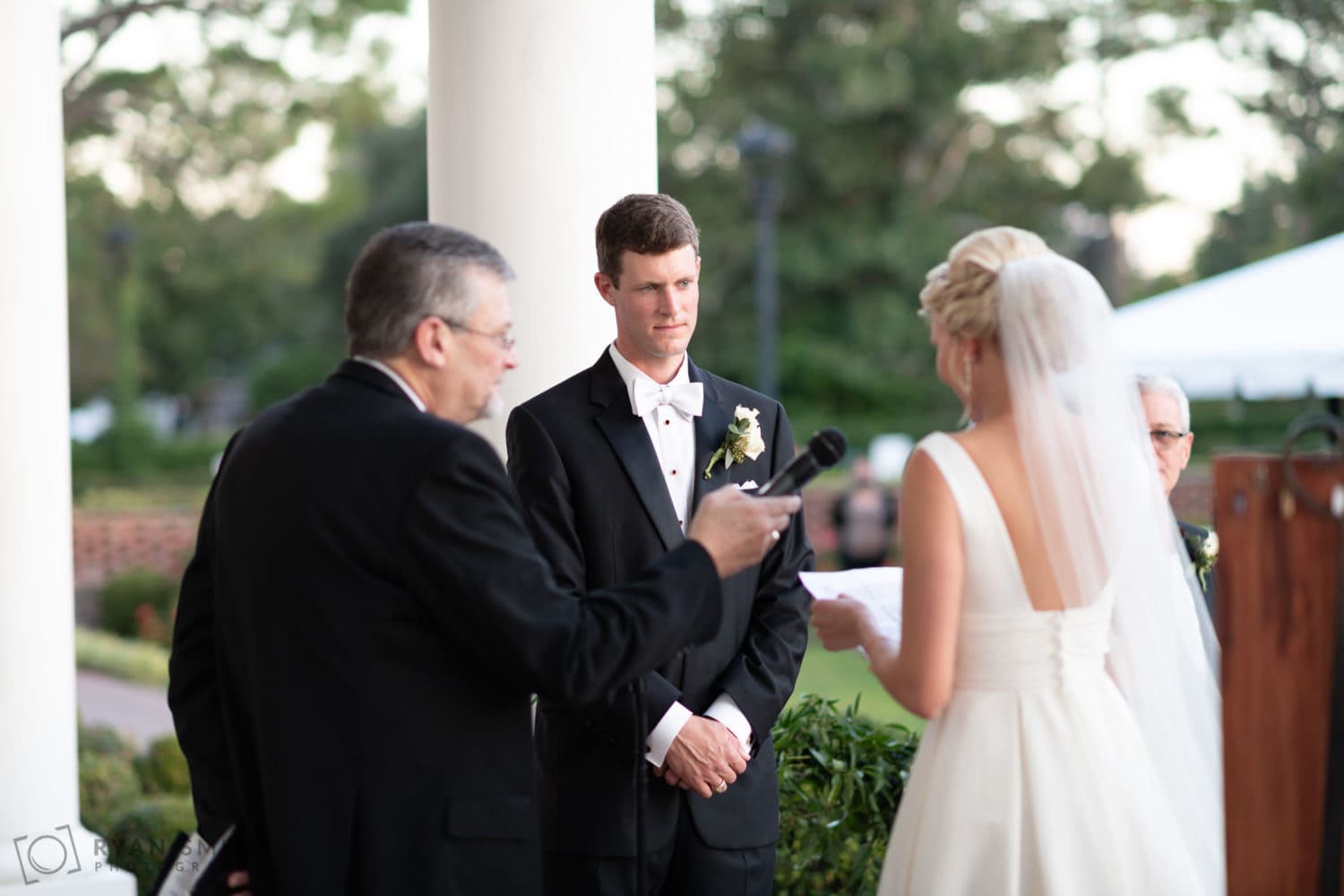 Groom listening to vows - Pine Lakes Country Club