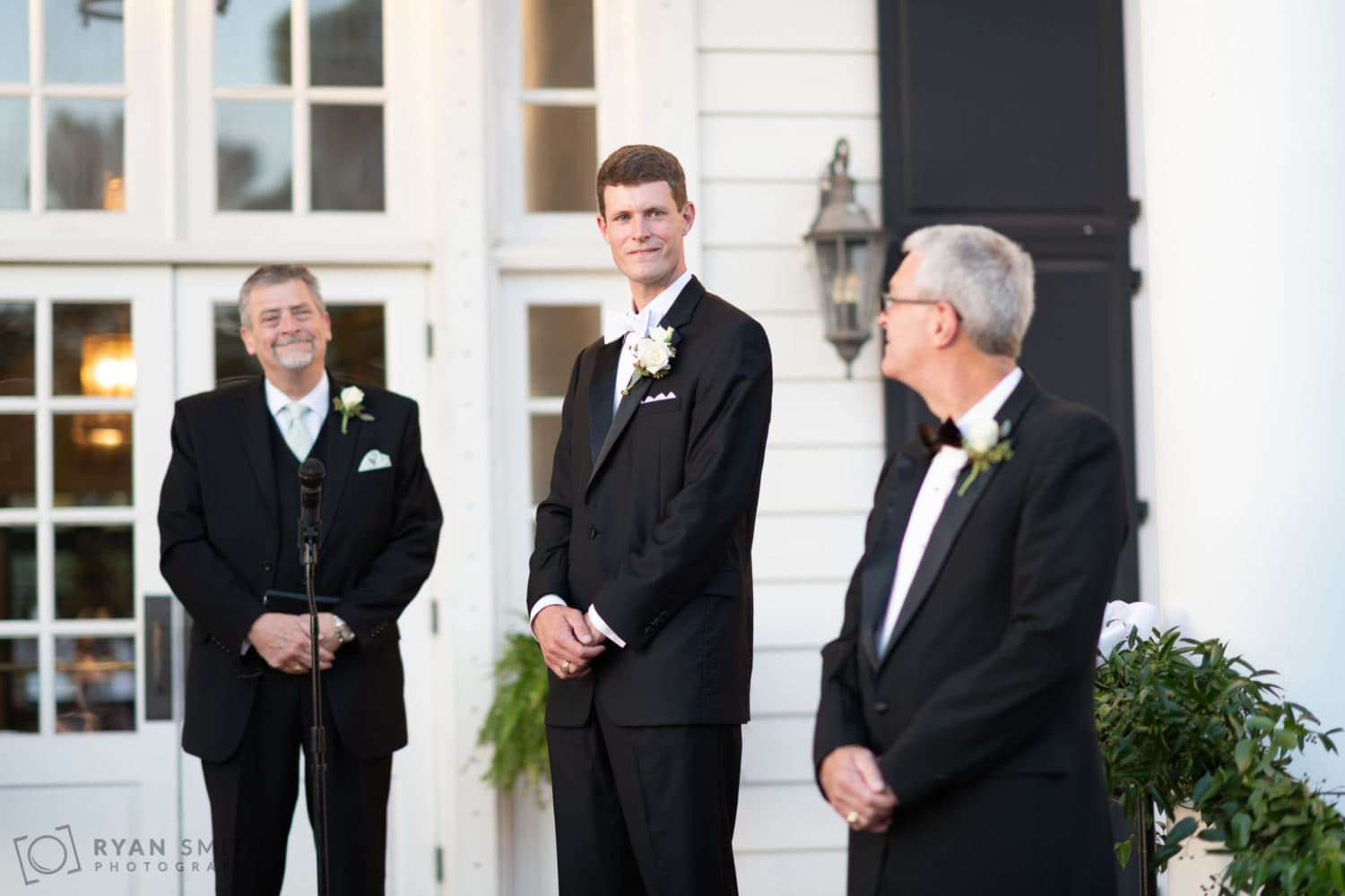 Groom looking at bride walking down the aisle  - Pine Lakes Country Club