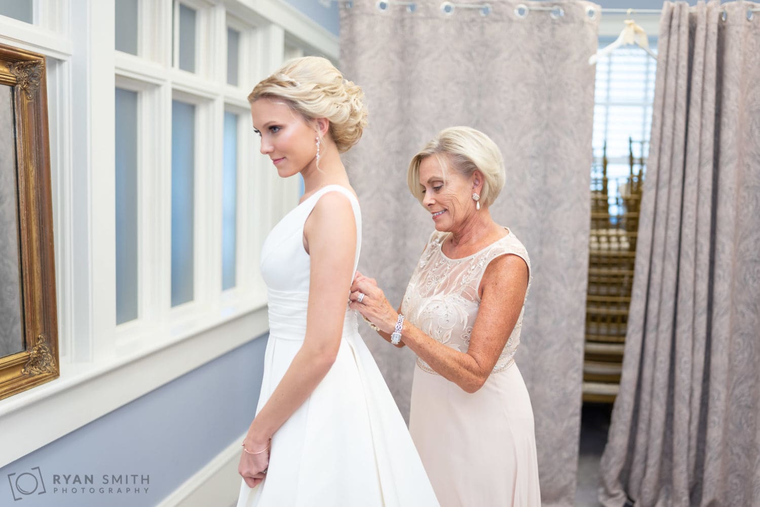 Mom helping bride with her dress - Pine Lakes Country Club