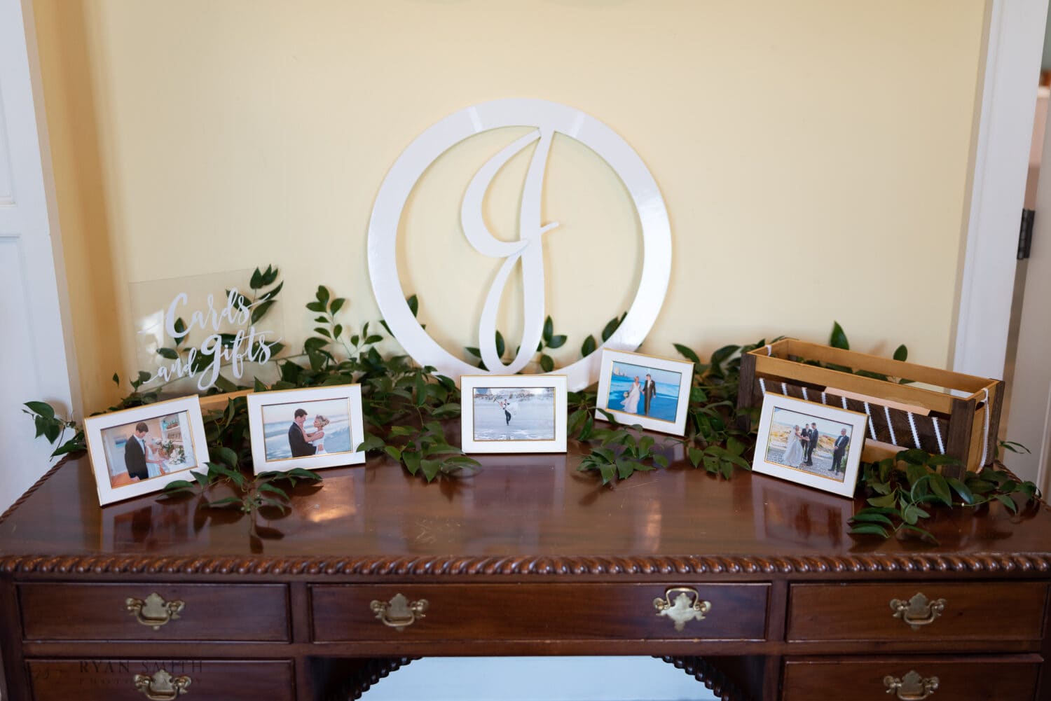 Pictures from first wedding on table - Pine Lakes Country Club