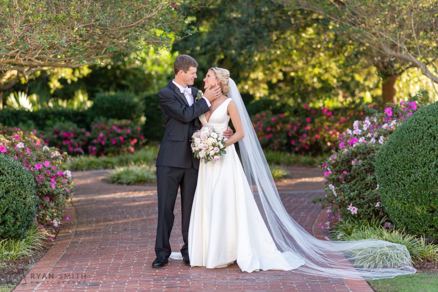 Portraits of the bride and groom on the garden path - Pine Lakes Country Club