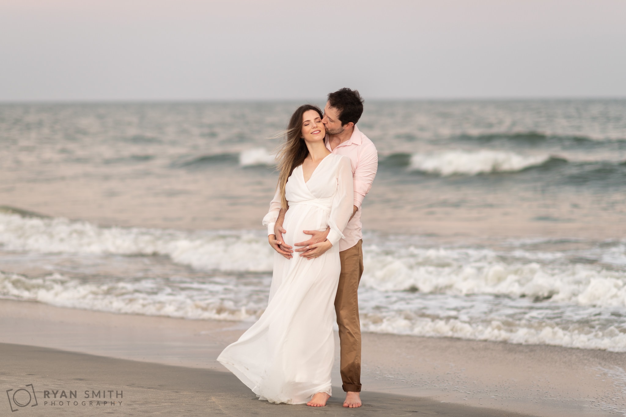 Maternity portraits in front of the ocean - Huntington Beach State Park